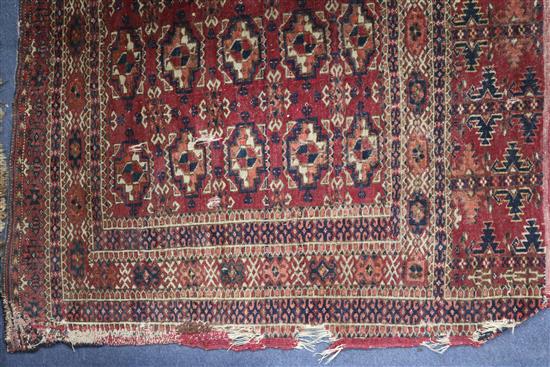 A Shiraz rug, a Bokhara saddlecloth and another rug (wear)